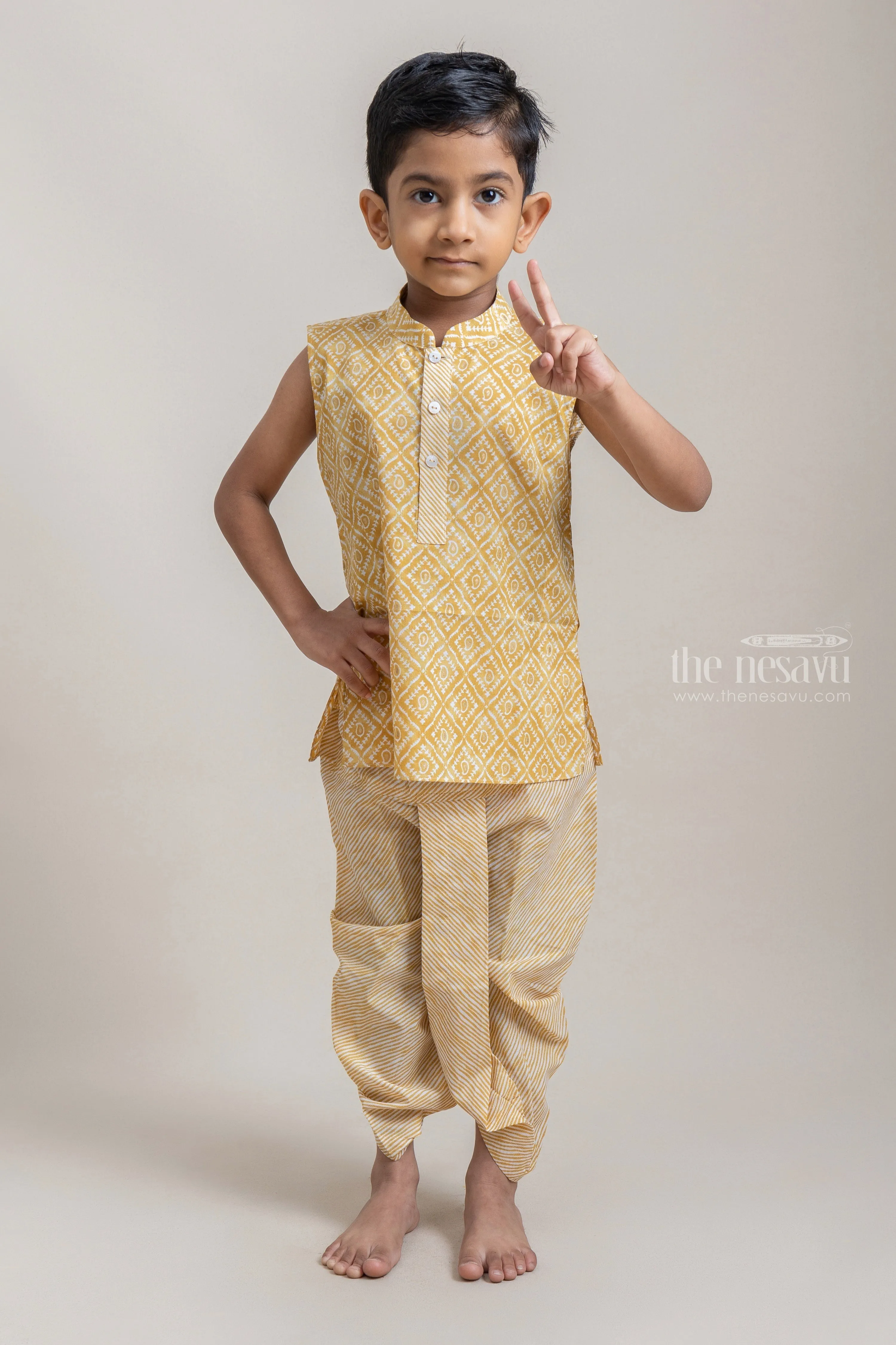 Amazing Yellow Tribal Printed Sleeveless Kurta With Striped Panchakacham For Boys