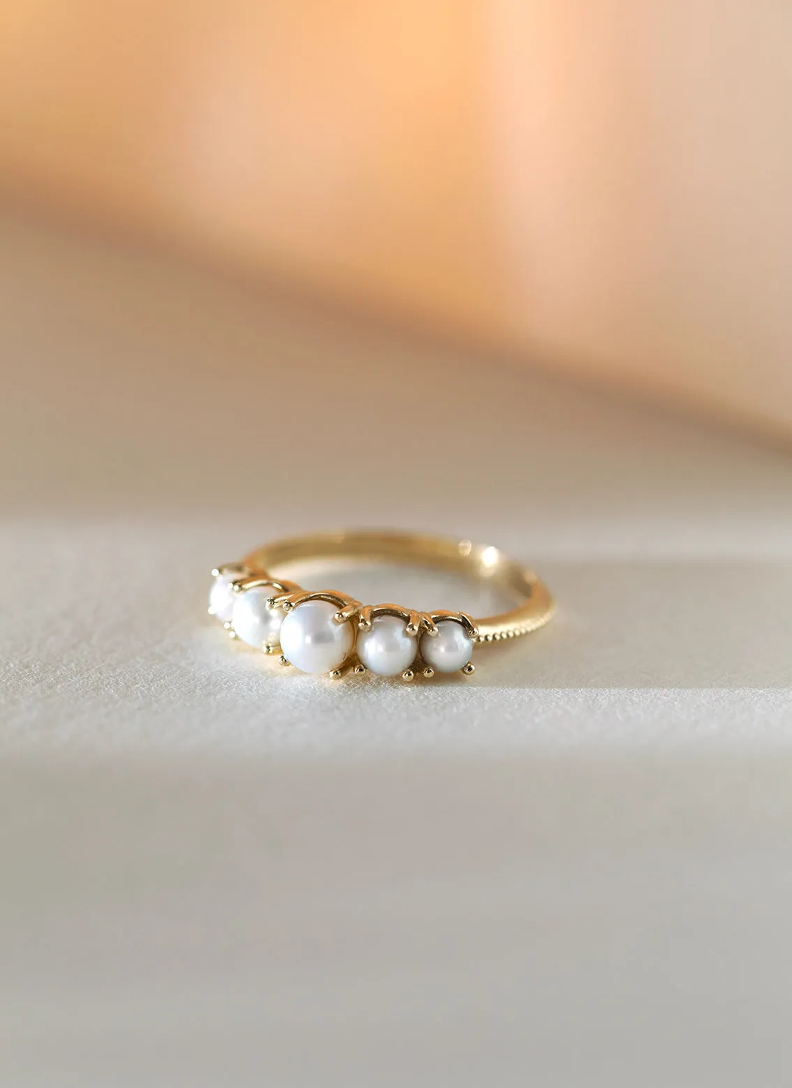 Lotta pearl ring 14k gold