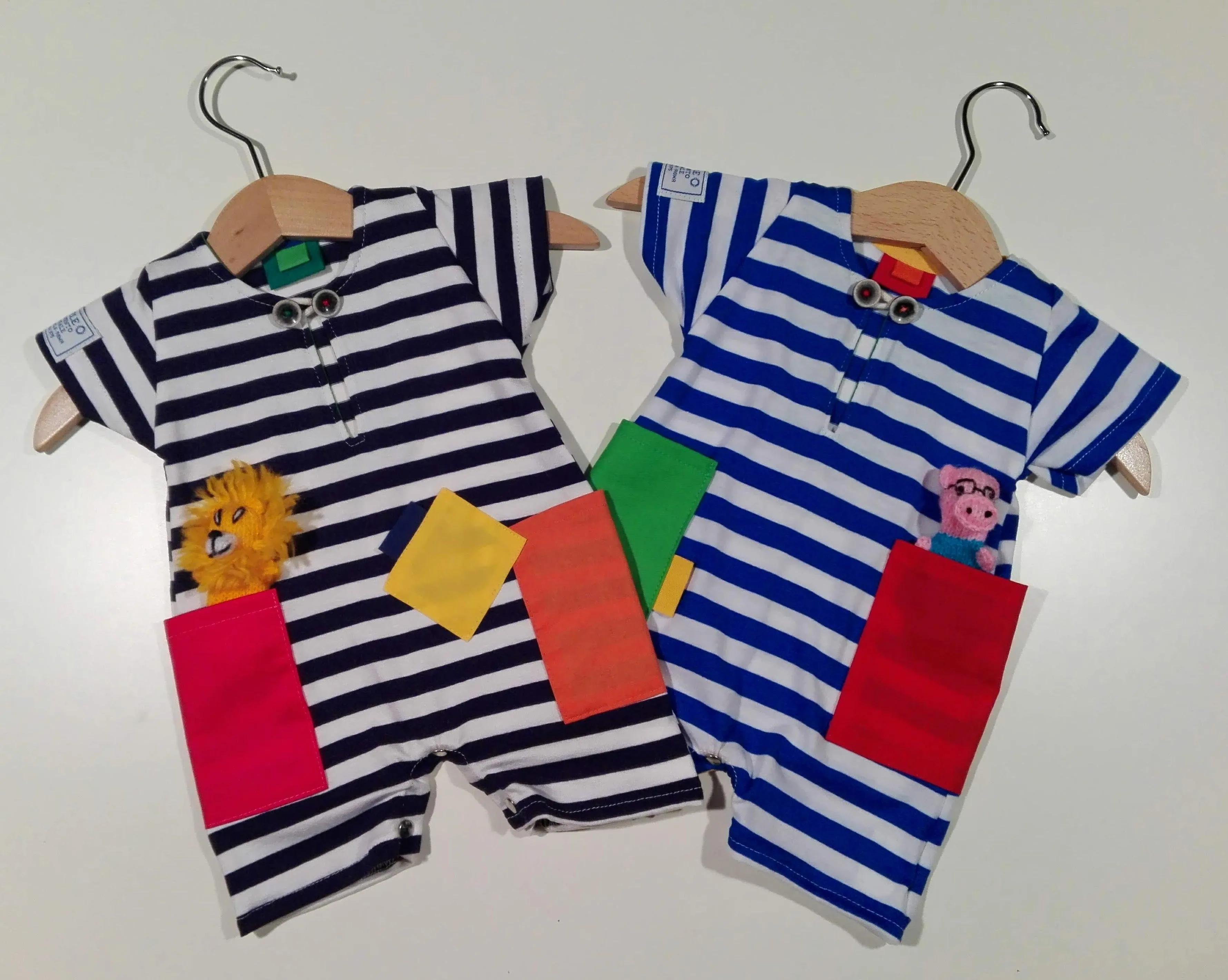 Short onesie in cotton with colored patches